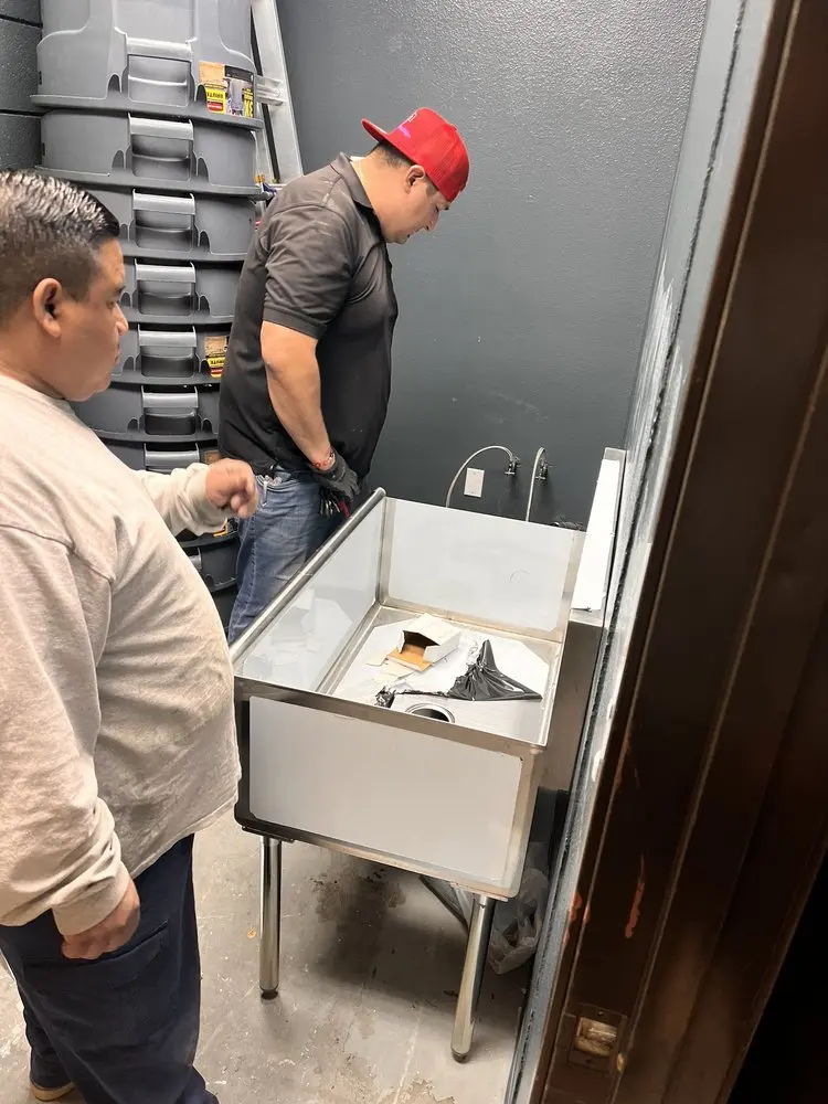 Commercial plumbing and sink installation in Columbus